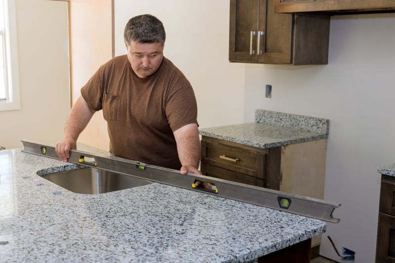 Experienced Granite Installer at Work
